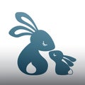 Vector silhouette illustration of a funny family of rabbits. Silhouette of a mother rabbit kissing her baby. Design