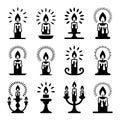Silhouette illustrations of various candle designs, each featuring a distinct holder and flame pattern Royalty Free Stock Photo