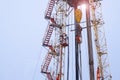 Silhouette image of oil and gas drilling rig in the middle of nowhere with dramatic sky. Onshore land rig in oil and gas industry