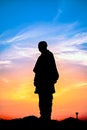 Silhouette image of Worlds tallest statue known as Statue of unity with beautiful sunset sky background