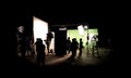 Silhouette images of video production behind the scenes
