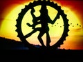 Silhouette of Indian Dancing God Shiva Nadarajah (Nataraja) Statue on red background. Religion or yoga concept.