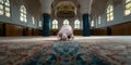 Silhouette of Indonesian Muslim man praying in the mosque