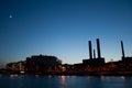 Silhouette of industrial landscape with chimneys tank