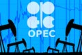 silhouette industrial oil pump jacks and oil graph with OPEC logo