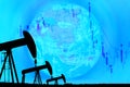 Silhouette industrial pump jack and falling oil graph on the blu