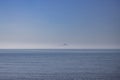 The silhouette of the island of Ponza emerging from the fog Royalty Free Stock Photo