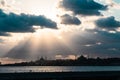Silhouette of Istanbul with sunrays between the clouds and dramatic sky
