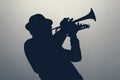 silhouette of a jazz man playing trumpet Royalty Free Stock Photo