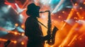 Silhouette of Jazz Musician Playing Saxophone on Stage with Colorful Dynamic Lights Royalty Free Stock Photo