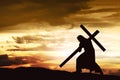 Silhouette of Jesus carry his cross Royalty Free Stock Photo
