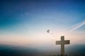 Silhouette jesus christ crucifix on cross on calvary sunset background concept for good friday he is risen in easter day, good Royalty Free Stock Photo