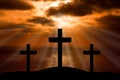 Silhouette of Jesus Christ crucifixion on cross, Good Friday Easter over heaven -Three Crosses On Hill landscape horizontal Royalty Free Stock Photo