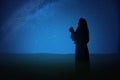 Silhouette of Jesus Christ raised hands and praying to god Royalty Free Stock Photo