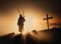 Silhouette of Jesus Christ Walking Towards the Sunrise Royalty Free Stock Photo