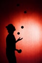 Silhouette of a juggler Royalty Free Stock Photo