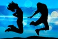 Silhouette of jumping teenagers