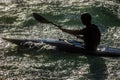 Silhouette of Kayaker in Strong Light on the Turbulent Soca