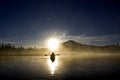 Silhouette Of Kayaker At Sunrise Royalty Free Stock Photo