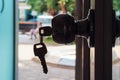 Silhouette of a key in the door lock