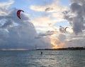 Silhouette of a Kite surfer in the ocean at sunset Royalty Free Stock Photo