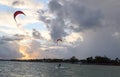 Silhouette of a Kite surfer in the ocean at sunset Royalty Free Stock Photo