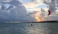 Silhouette of a Kite surfer in the ocean at sunset Royalty Free Stock Photo