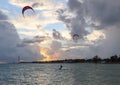 Silhouette of a Kite surfer in the ocean at sunset Royalty Free Stock Photo