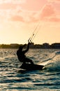 Silhouette of a kitesurfer flying Royalty Free Stock Photo
