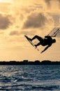 Silhouette of a kitesurfer flying Royalty Free Stock Photo