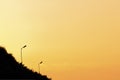 Silhouette lampposts in the dawn sky background Royalty Free Stock Photo