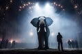 Silhouette Of A Large Elephant And A Small Man In The Arena. Circus Performance Concept. Generated By Artificial