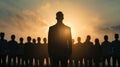 Silhouette of a leader standing in front of a group Royalty Free Stock Photo