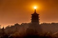 Silhouette Leifeng Pagoda is a five stories tall tower with eight sides, located on Sunset Hill south of the West Lake in Hangzhou Royalty Free Stock Photo