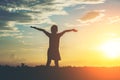 Silhouette of little girl raising hand to happy time Royalty Free Stock Photo