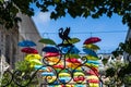 Silhouette of a Liverbird in front of the floating umbrellas