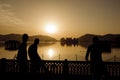 Silhouette of local Indian young boys in the palace Jal Mahal