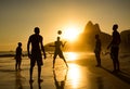 Silhouette of Locals Playing Ball at Sunset in Ipanema Beach, Rio de Janeiro, Brazil