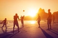 Silhouette of Locals Playing Ball at Sunset in Ipanema Beach, Rio de Janeiro, Brazil Royalty Free Stock Photo