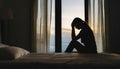 Silhouette of Lonely young woman feeling depressed and stressed