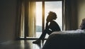 Silhouette of Lonely young woman feeling depressed and stressed