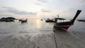 Silhouette of longtail Boat at Sunrise Beach, Koh Lipe island, T