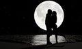 Silhouette Lovers Kissing Romanticly There is a full moon and a star full of the sky as the background. The moon`s reflection is Royalty Free Stock Photo