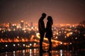 Silhouette of a loving couple on a background of the night city Royalty Free Stock Photo