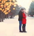 Silhouette of loving couple embracing in warm winter day Royalty Free Stock Photo