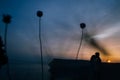 Silhouette of a loving couple kissing in the sunset Royalty Free Stock Photo