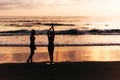 Silhouette of loving couple on sea. A couple in love at sunset. Man and woman meet sunset. Happy loving couple. Silhouette lovers Royalty Free Stock Photo
