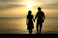 Silhouette of a  loving couple at sunset on the seashore Royalty Free Stock Photo