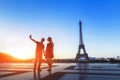 Silhouette of a loving couple taking selfie portrait photo in front of Eiffel Tower, Trocadero, Paris, France Royalty Free Stock Photo