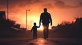 Silhouette of loving father walking side by side, holding hands with his son in the sunset Royalty Free Stock Photo